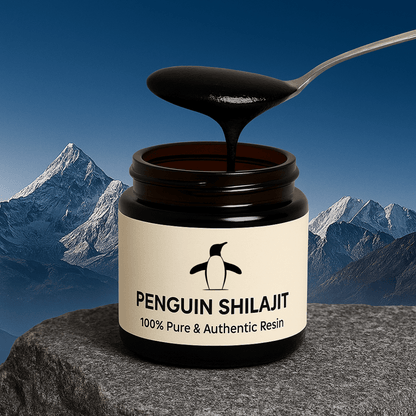 Jar of Penguin Shilajit with a spoonful of resin against a mountainous background